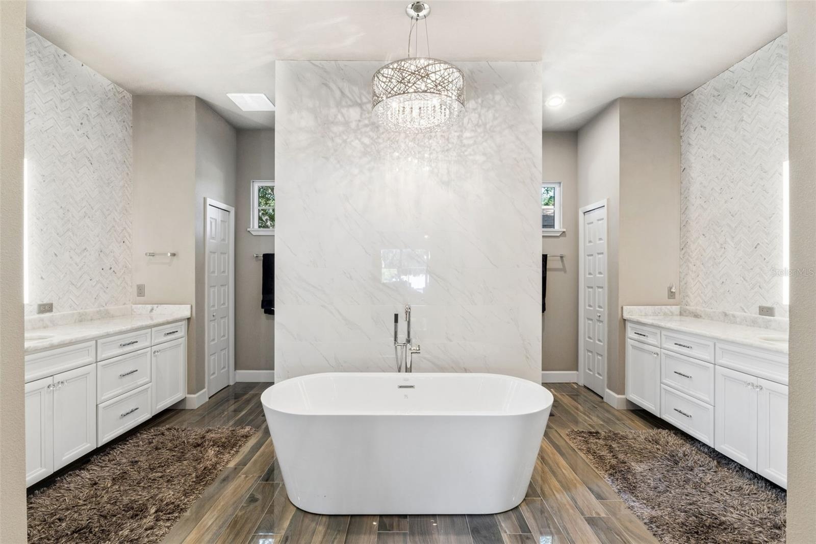 Polished Ceramic tile floor with dual linen closets