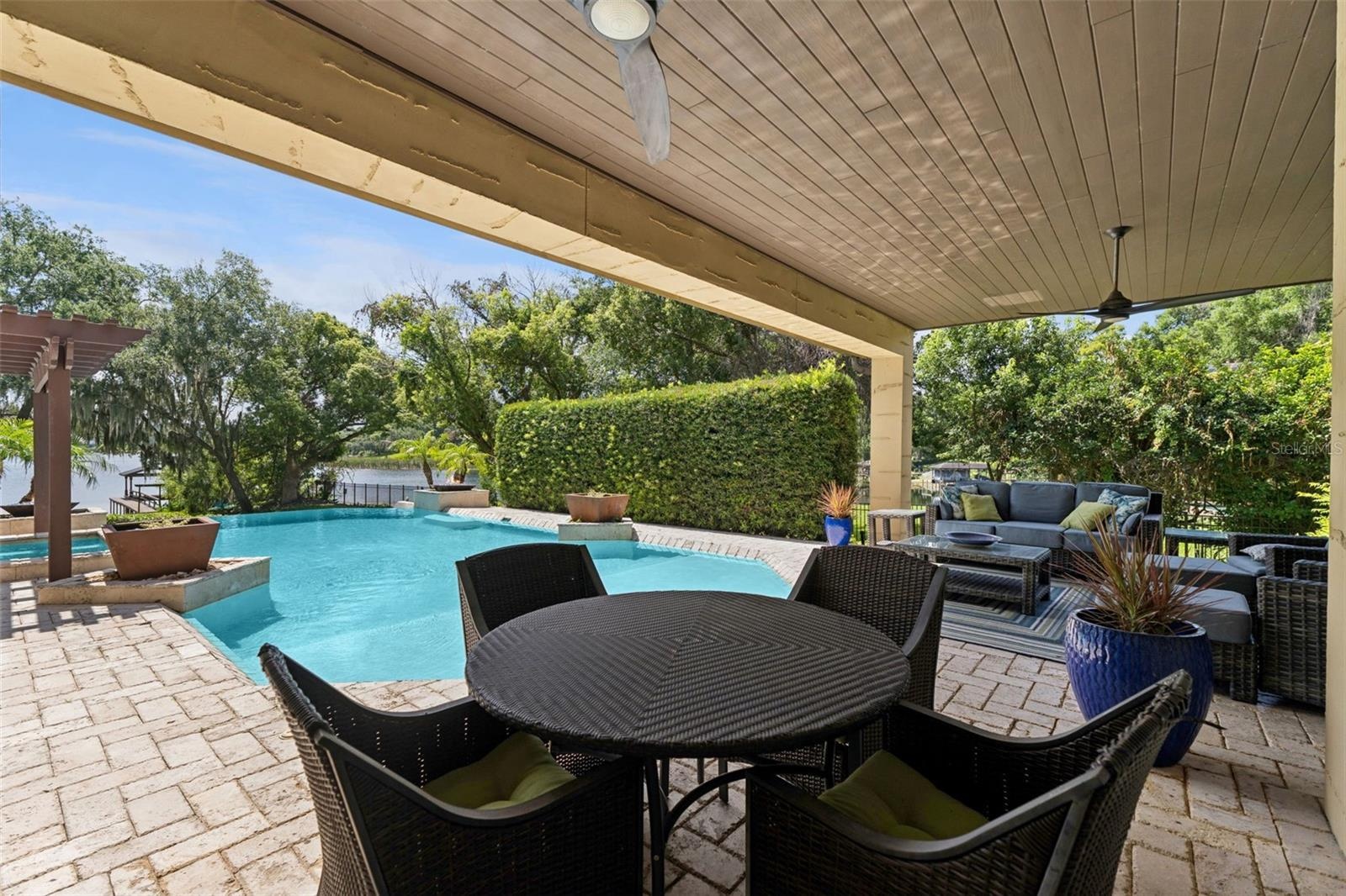 Lanai large enough for a dinette table and lounges