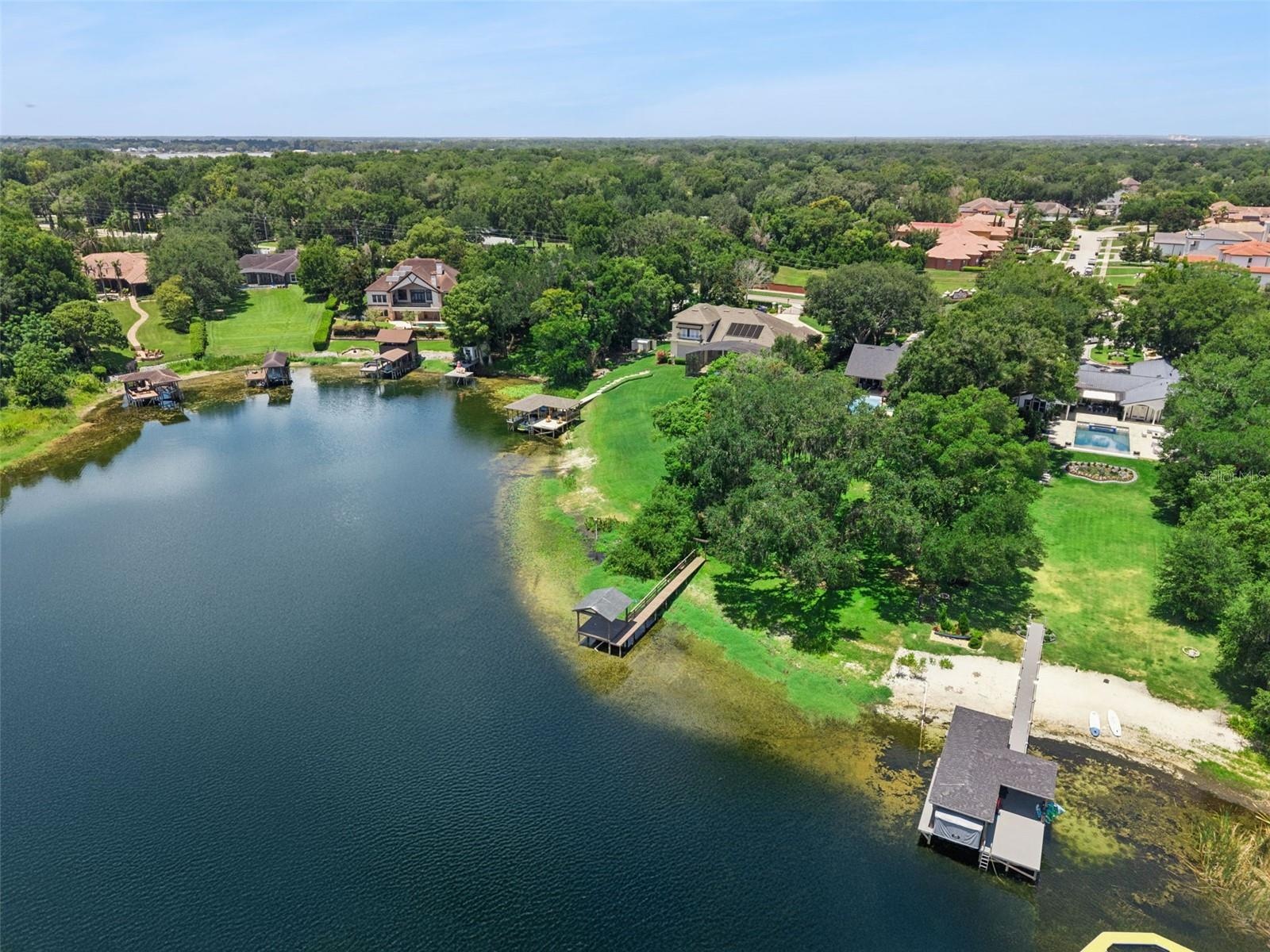 Neighbor converted their shoreline to a beach.