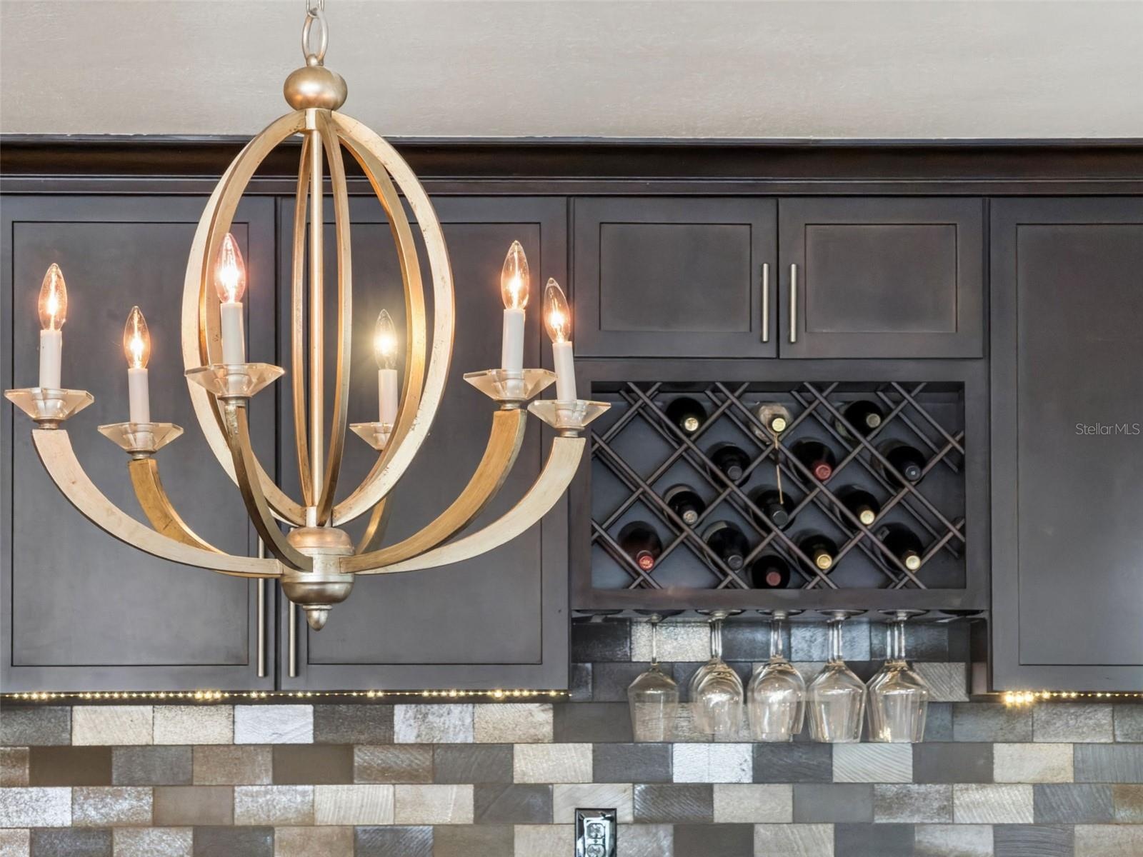 Under Cabinet lighting with wine rack and wine fridge below