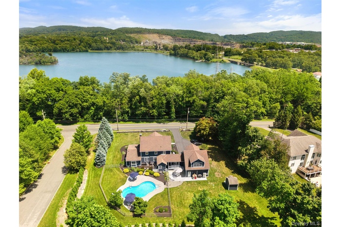 Welcome to 211 Strawtown Road in West Nyack with seasonal lake views!