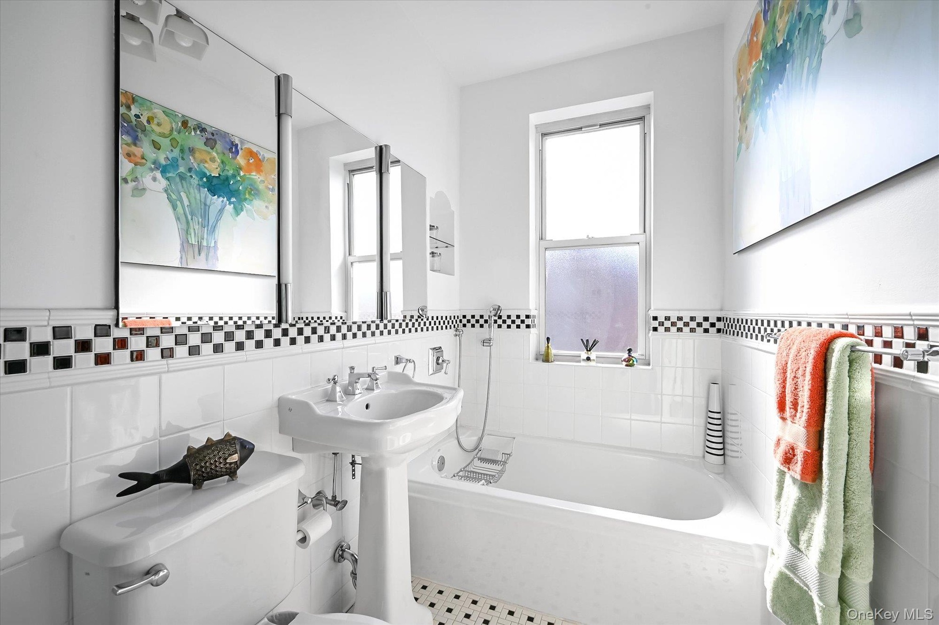 The oversized bathroom provides the luxury of both a separate shower and a full tub