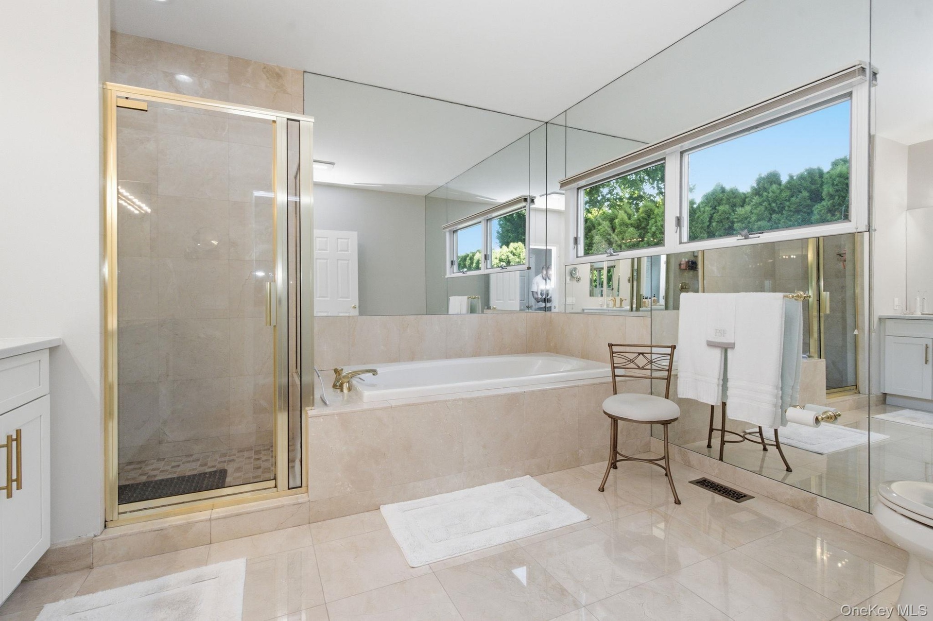 Primary Bathroom with Shower and Tub