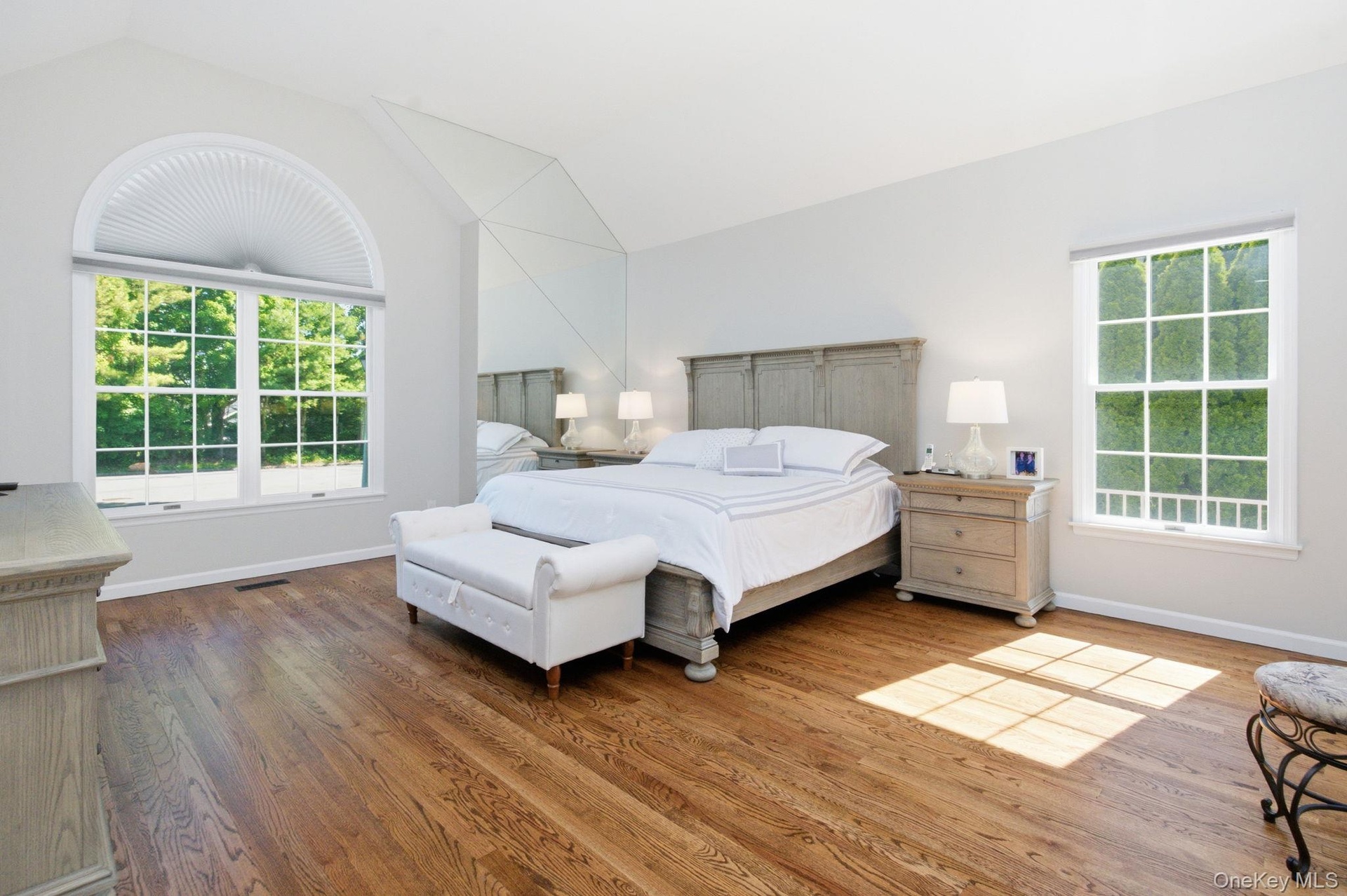 Primary Bedroom with Hardwood Floors