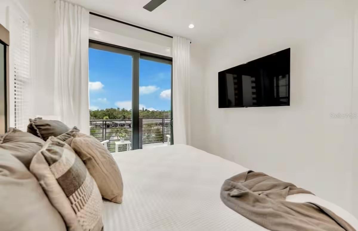 85 AVENIDA MESSINA, SARASOTA FL 34242 MLS#A4686937bedroom and balcony