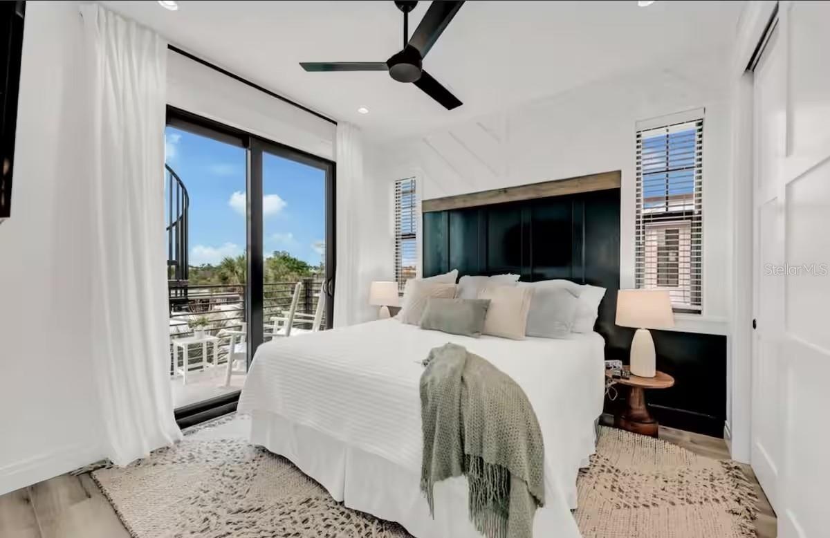 85 AVENIDA MESSINA, SARASOTA FL 34242 MLS#A4686937bedroom and balcony
