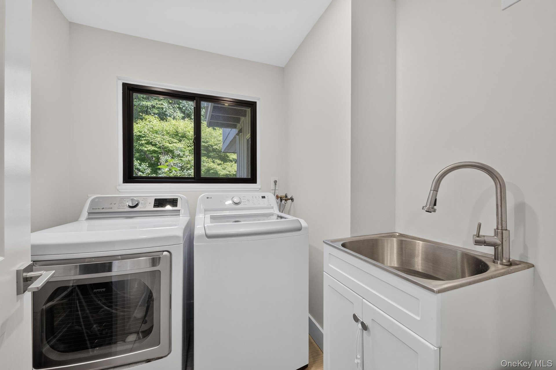 Laundry Room-washer dryer removed. Picture for placement only