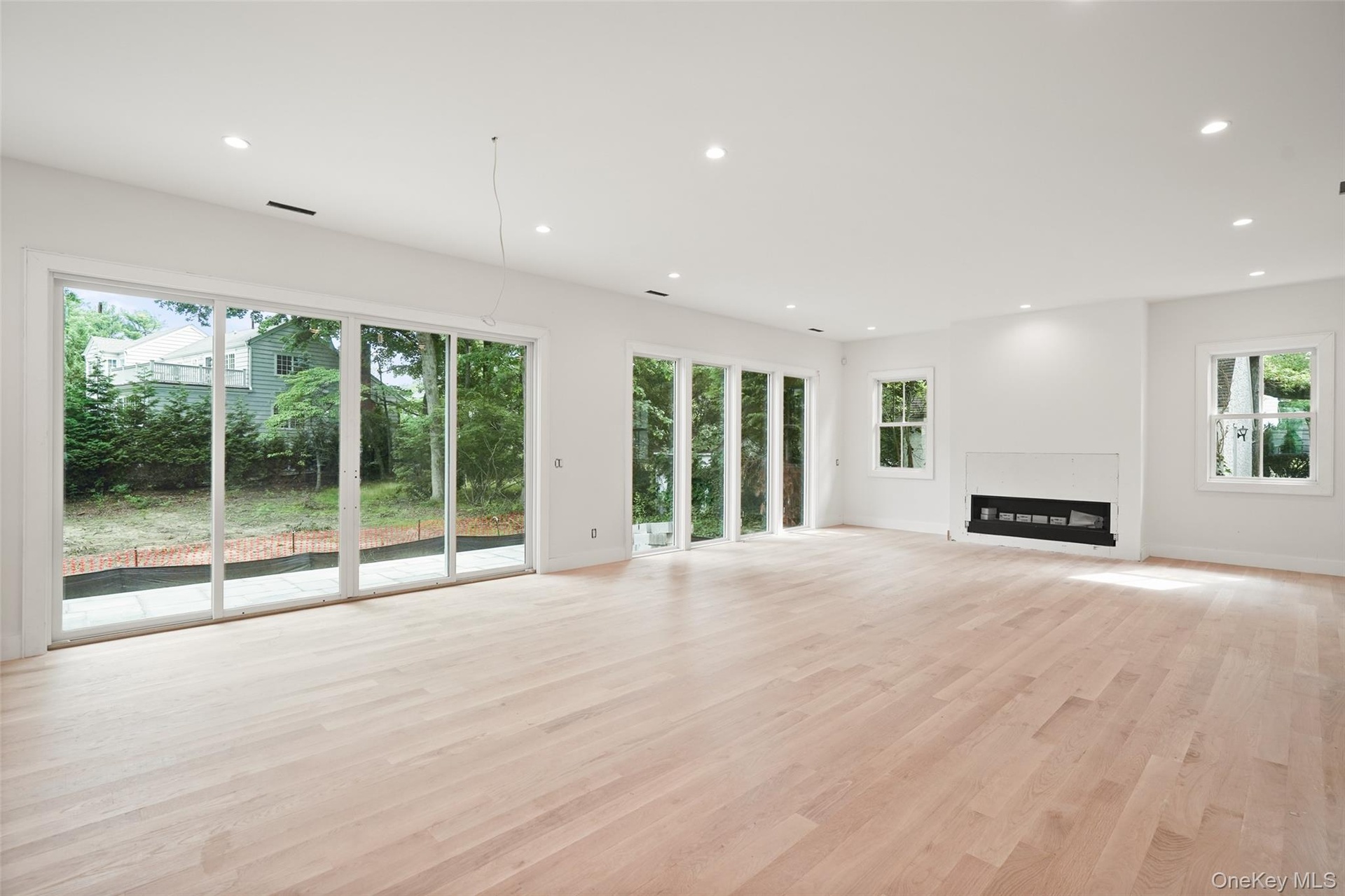 Great room with floor to ceiling windows