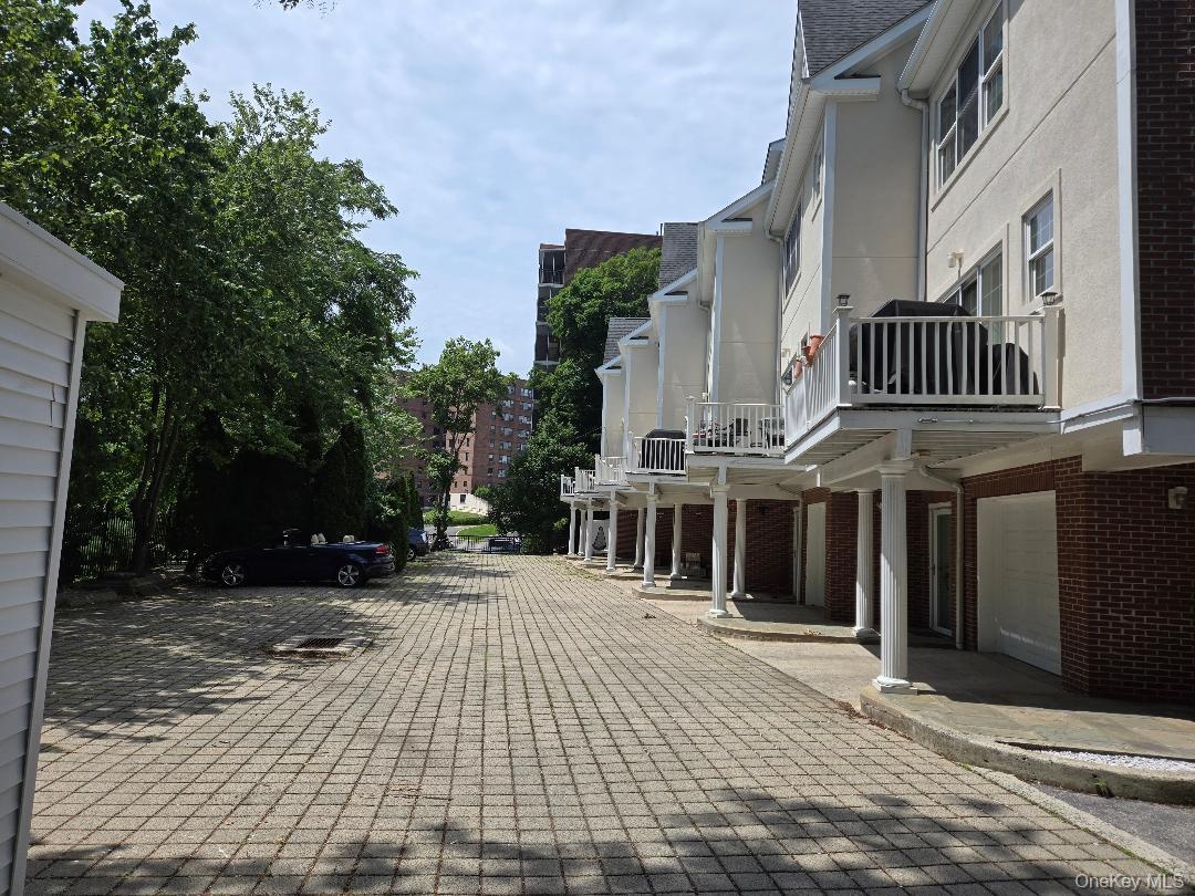 Huge Parking lot, allowing the tenants to have 2 extra spaces besides their own private garage!