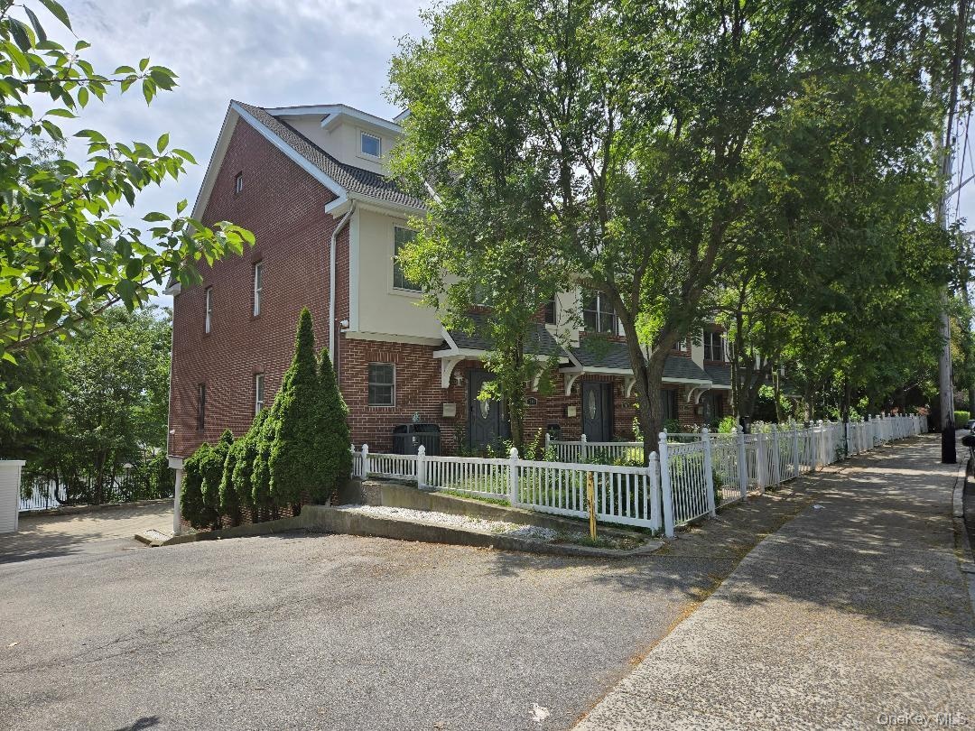 Side view, emphasizing how large the units are...This is 240 Pelham Road which is an end unit. It boasts the extra windows on the side!
