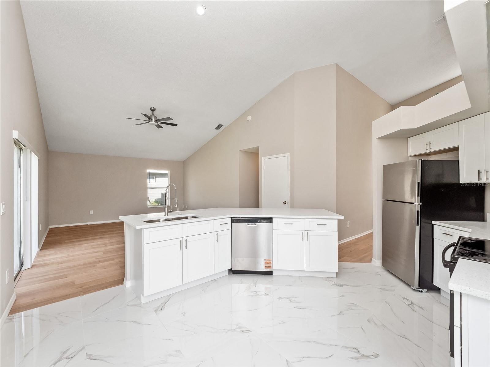 Kitchen to family room area and eating area