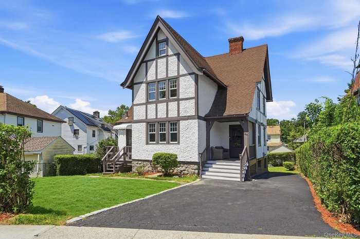 Classic Tudor Character Welcomes You Home- 184 W Post Road!
