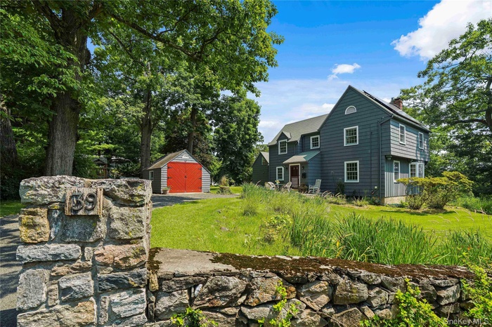 Welcome to 39 Forest Ave, a timeless 1929 Colonial nestled in the picturesque Riverview Manor section of Hastings-on-Hudson.