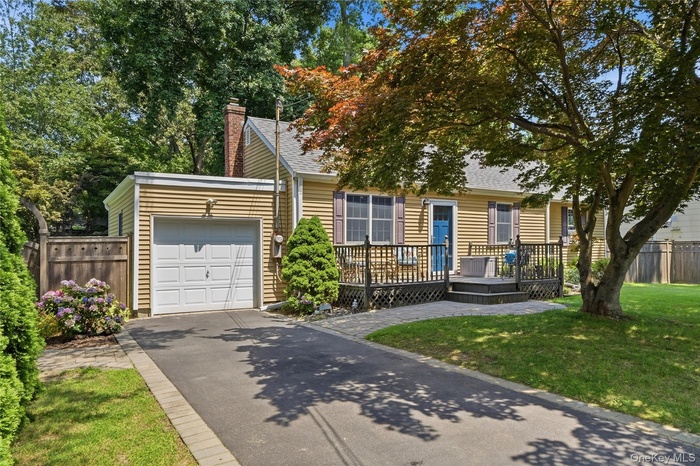 3-4 car driveway, garage and deck