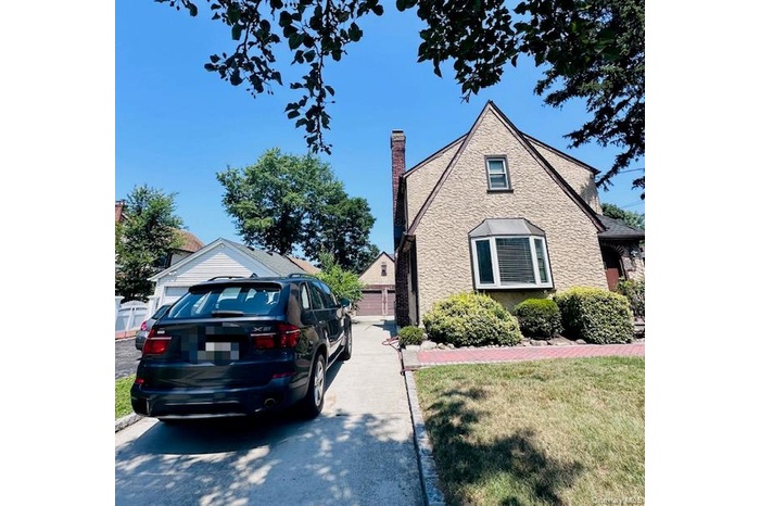 Front of the house with two garages