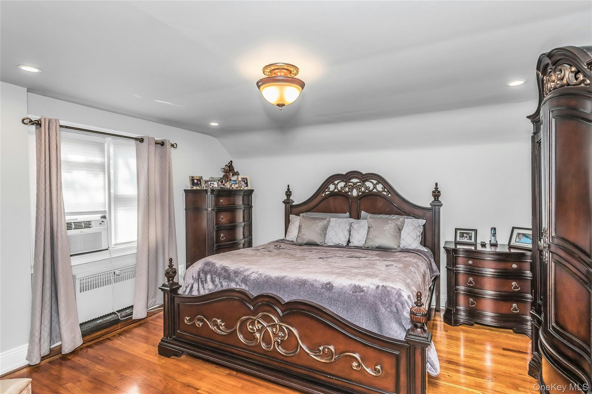 Oversized Primary Bedroom features a custom double closet a well as a third closet