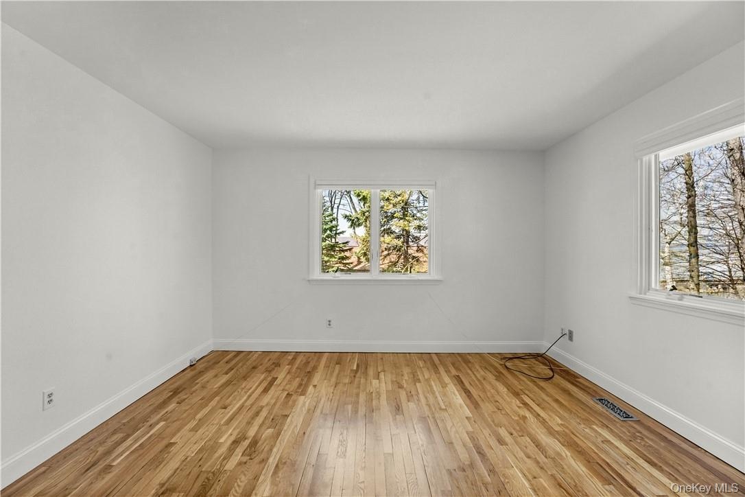 Another view of the primary bedroom