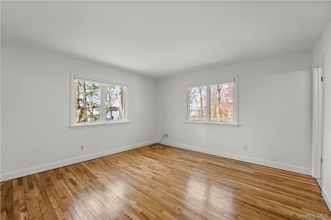 Another view of the primary bedroom