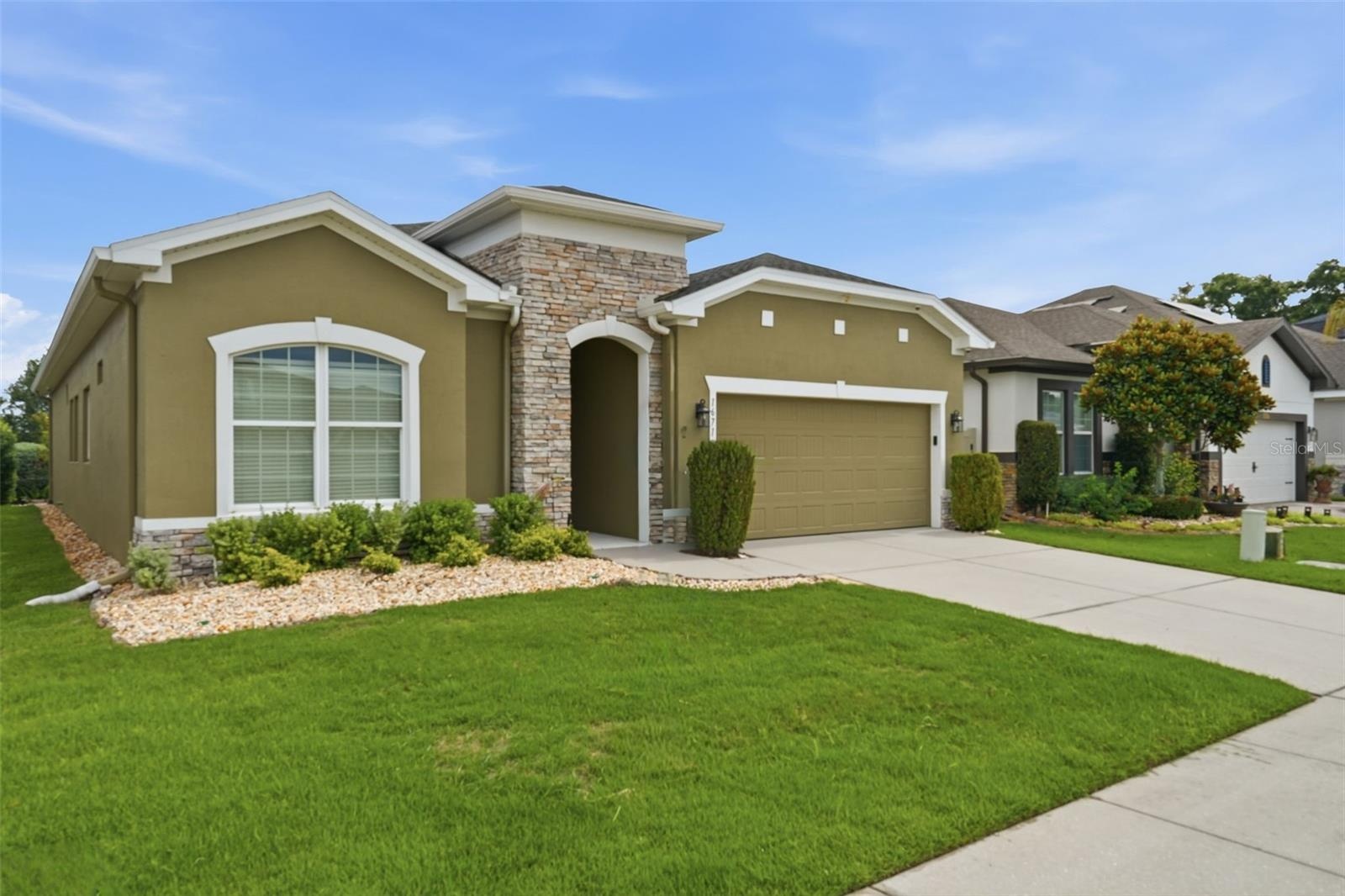Welcome home to 16716 Abbey Hill Ct. in John's Lake Landing