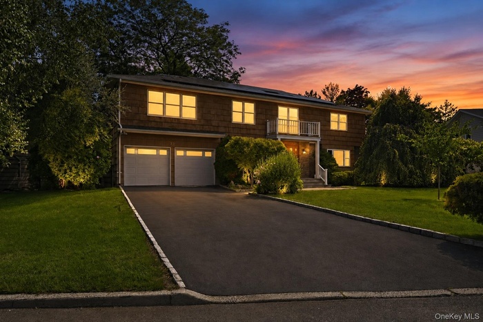 A timeless Colonial with exceptional curb appeal in prestigious Bloomingdale Estates.