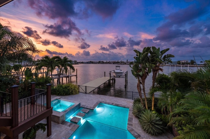 Enchanting evenings from the privacy of this remarkable oasis, located on one of Indian Rocks Beach protected coves.