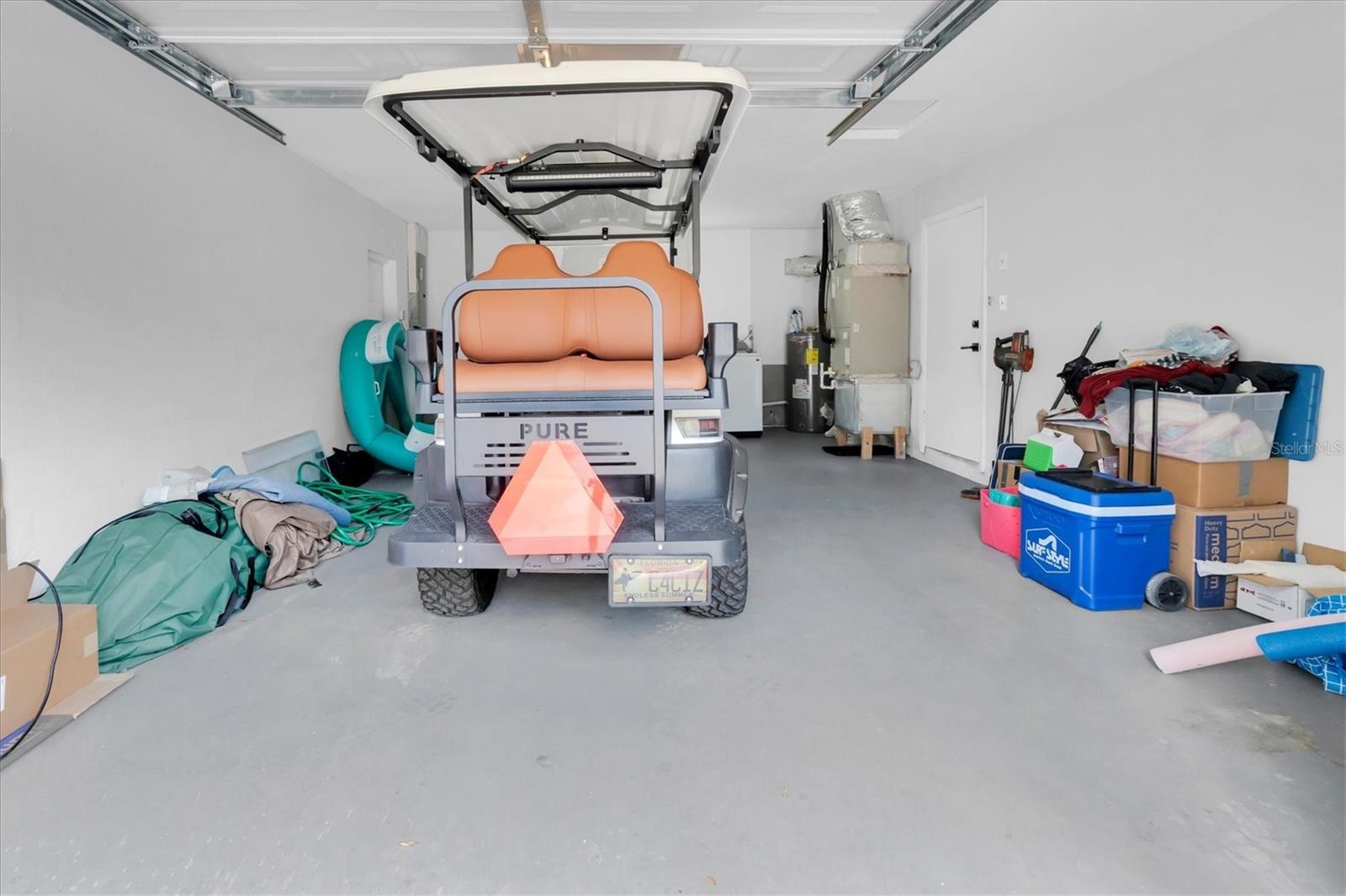 Wide One Car Garage w/ Plenty of Storage