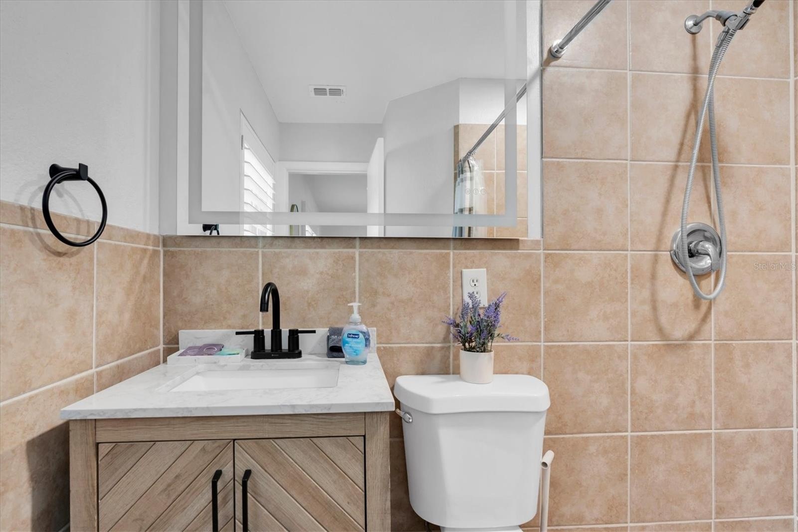 En-Suite Primary Bath w/ Smart Mirror