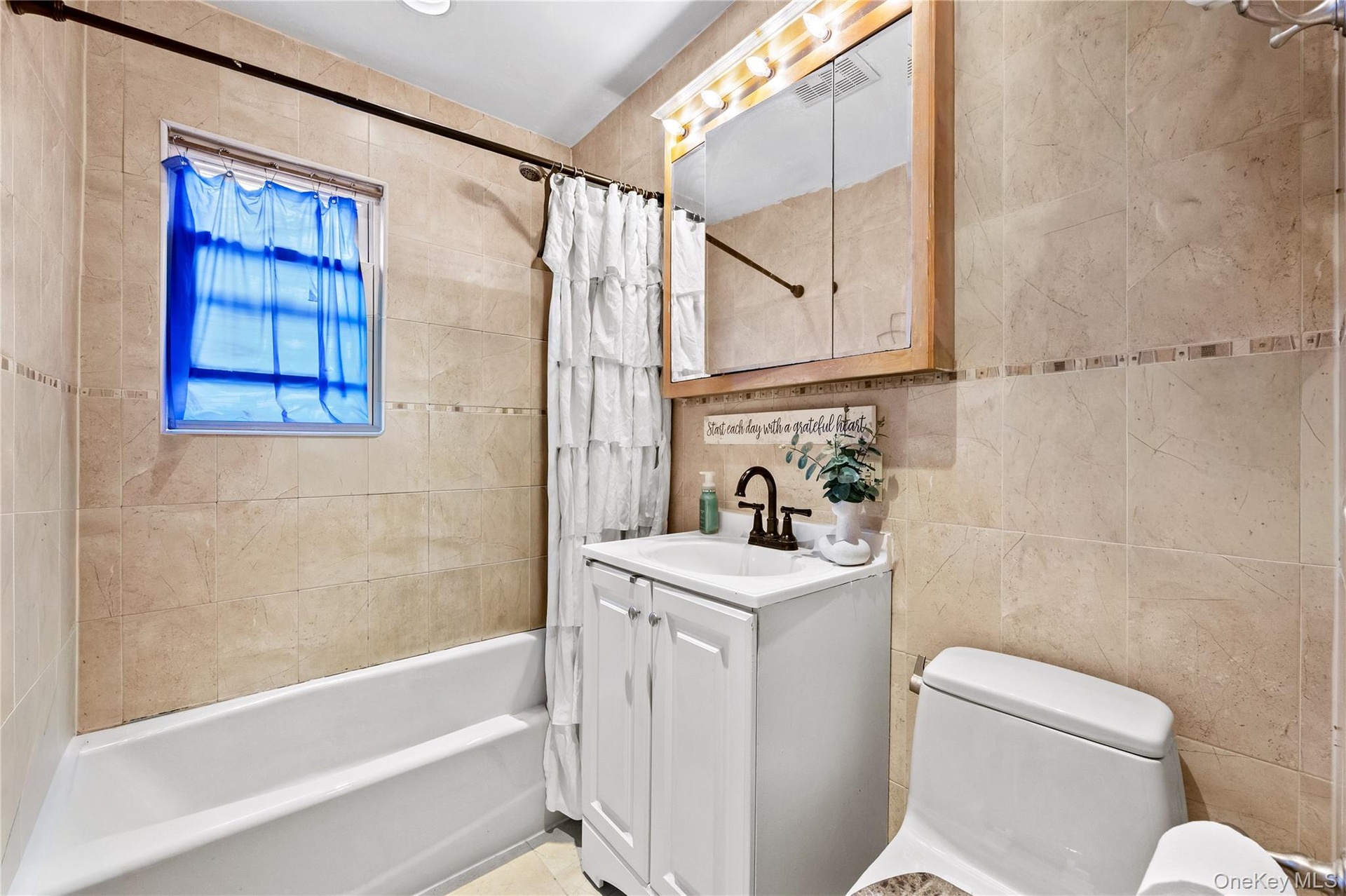 Full Bathroom - integrated lighting, and a white bathtub
