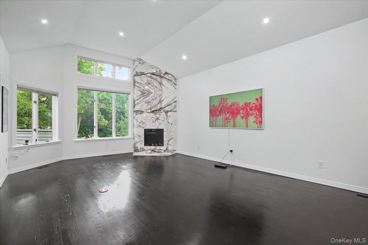 Newly refinished and stained hardwood floors throughout main level.