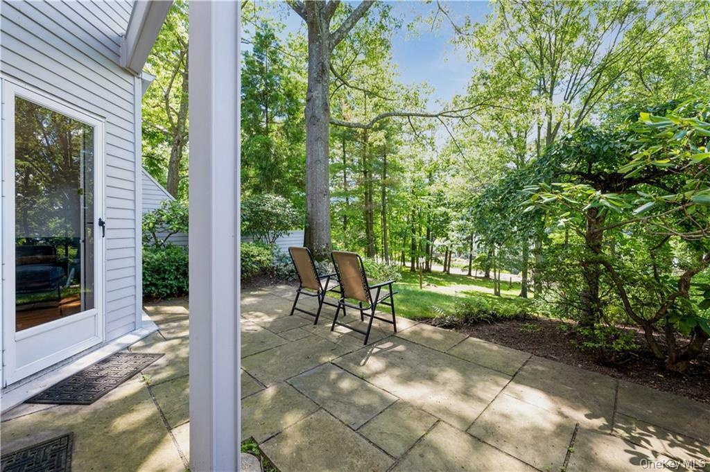 Paved stone patio accessible from both lower level bedroms.