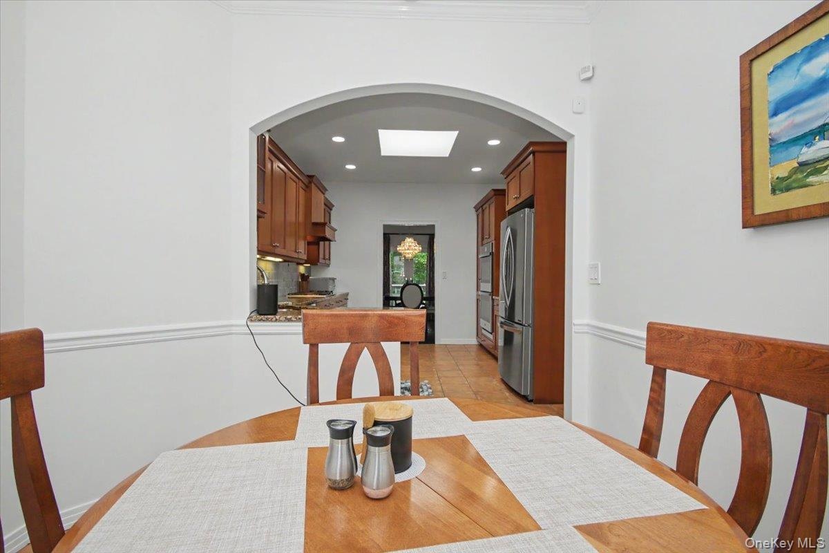 Elegant arch into dining room.