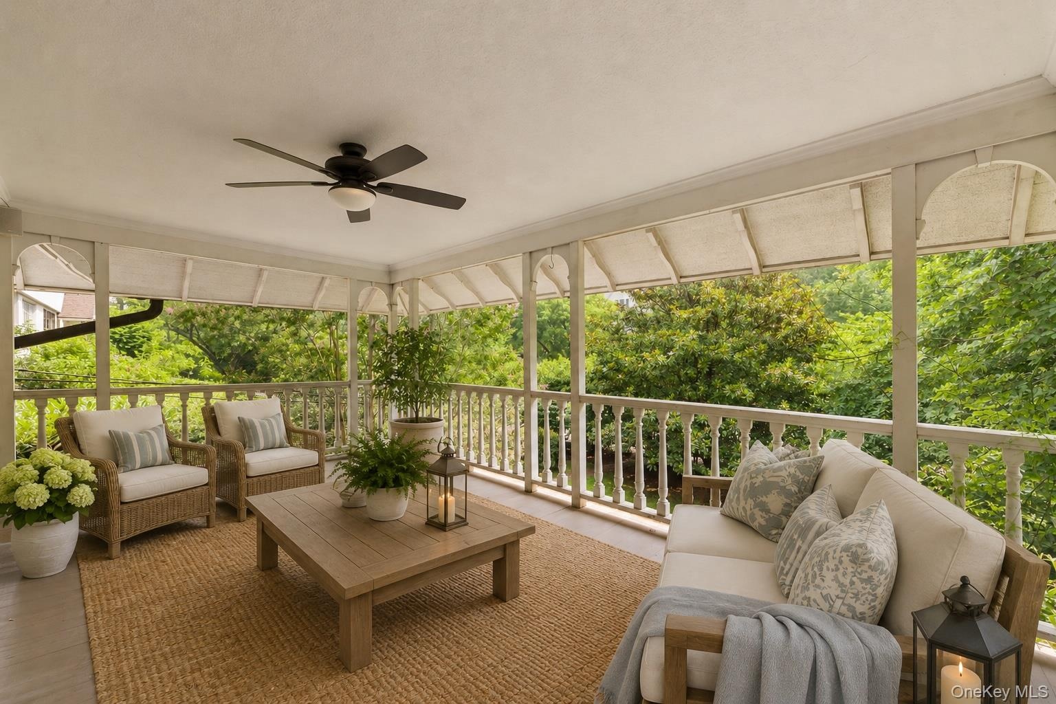 Virtually staged second level Covered Porch located off of the Primary Bedroom Ensuite.