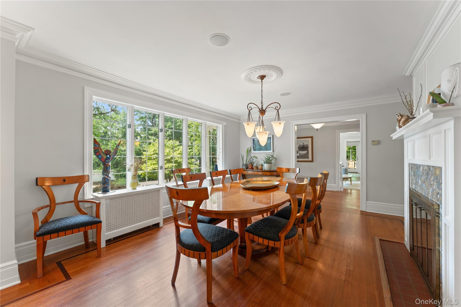 Formal Dining Room with wood-buring fireplace.