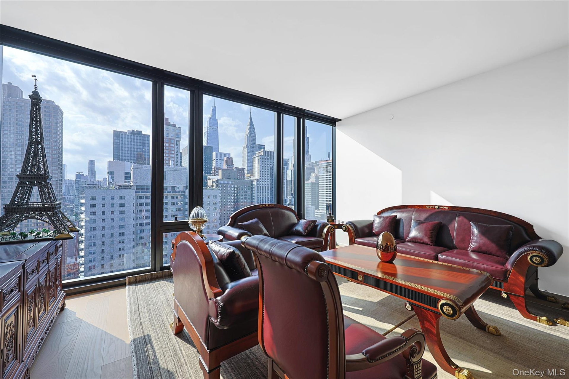 Floor-to-ceiling windows with expansive city scenery
