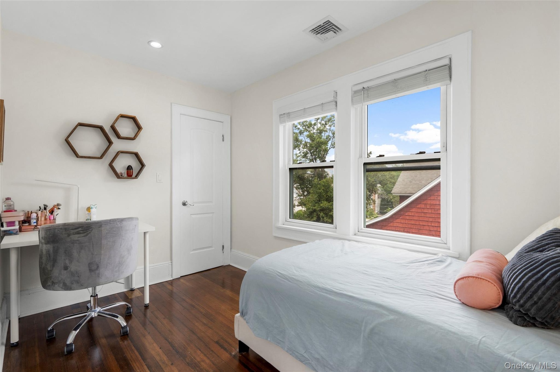 Another bedroom with walk-in closet.
