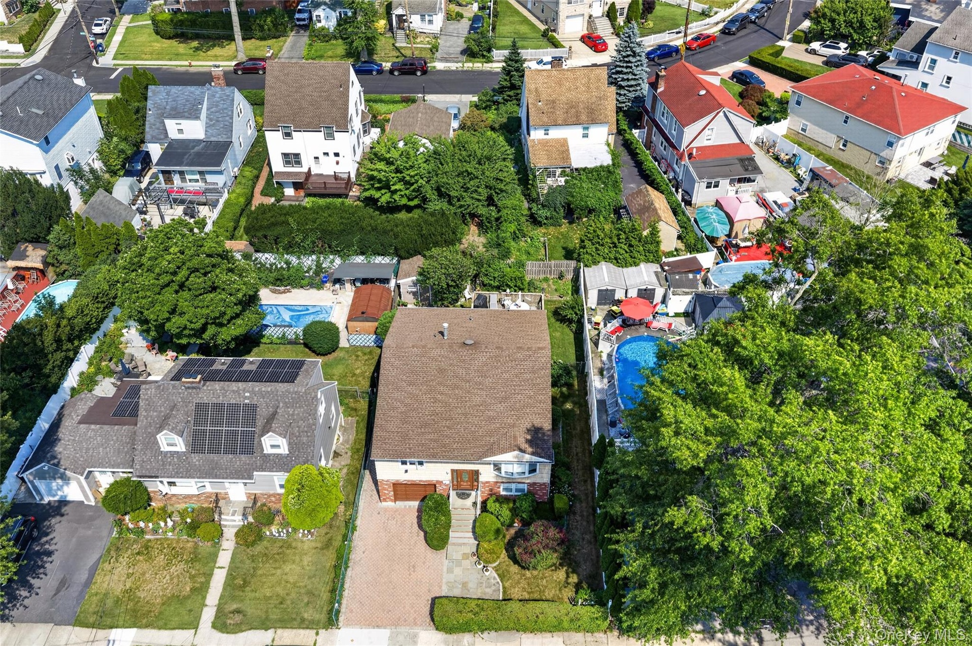 Aerial perspective showcasing several residential properties