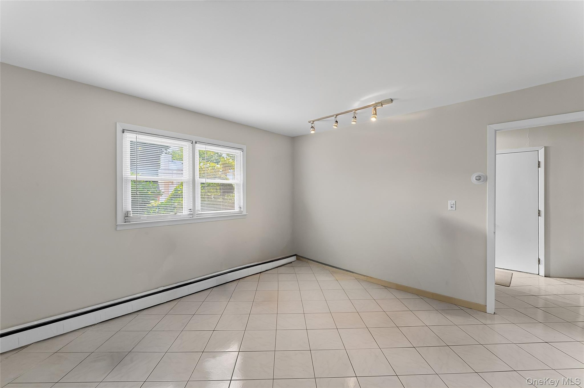 Light-toned tile flooring throughout