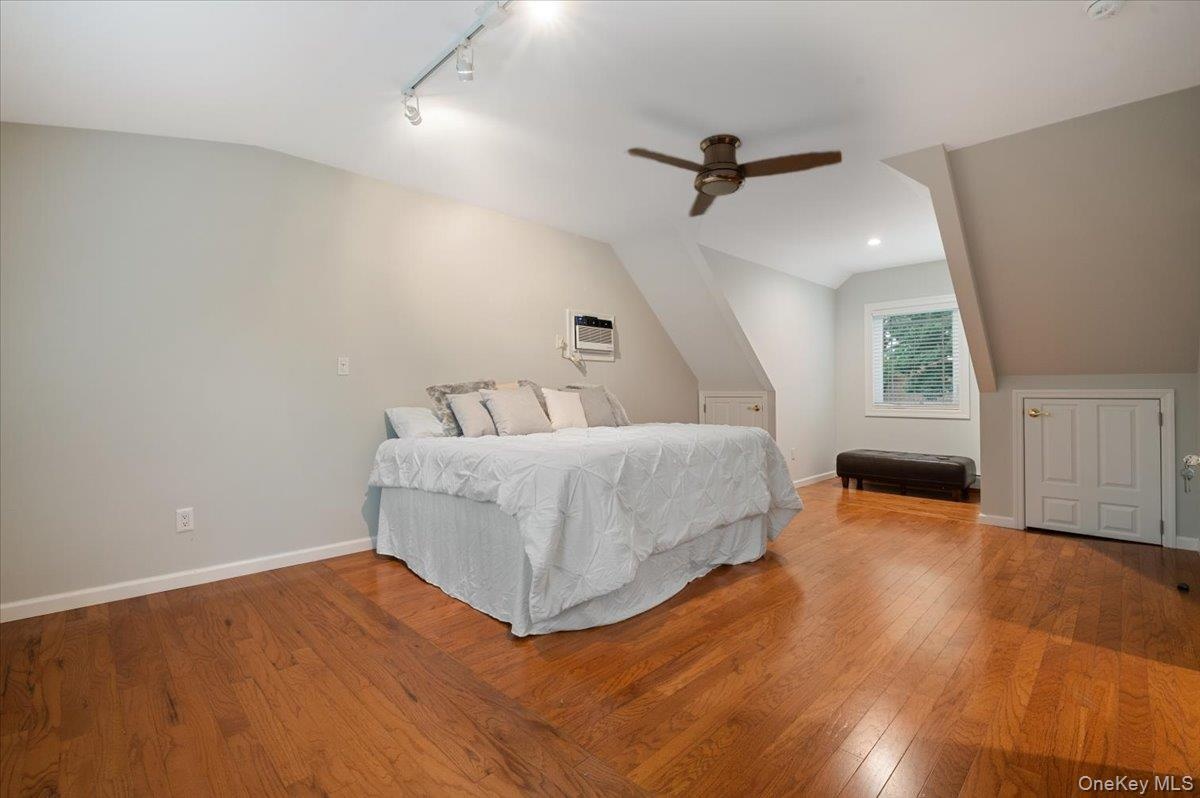 Second Primary Located Upstairs is King Sized Plus with Cathedral Ceilings and Hardwood Floors.