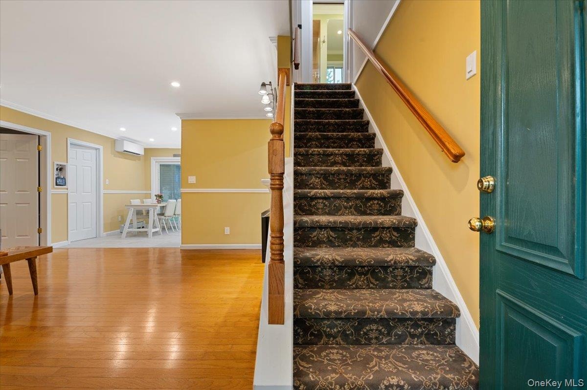 Gleaming Hardwood and Custom Stairs