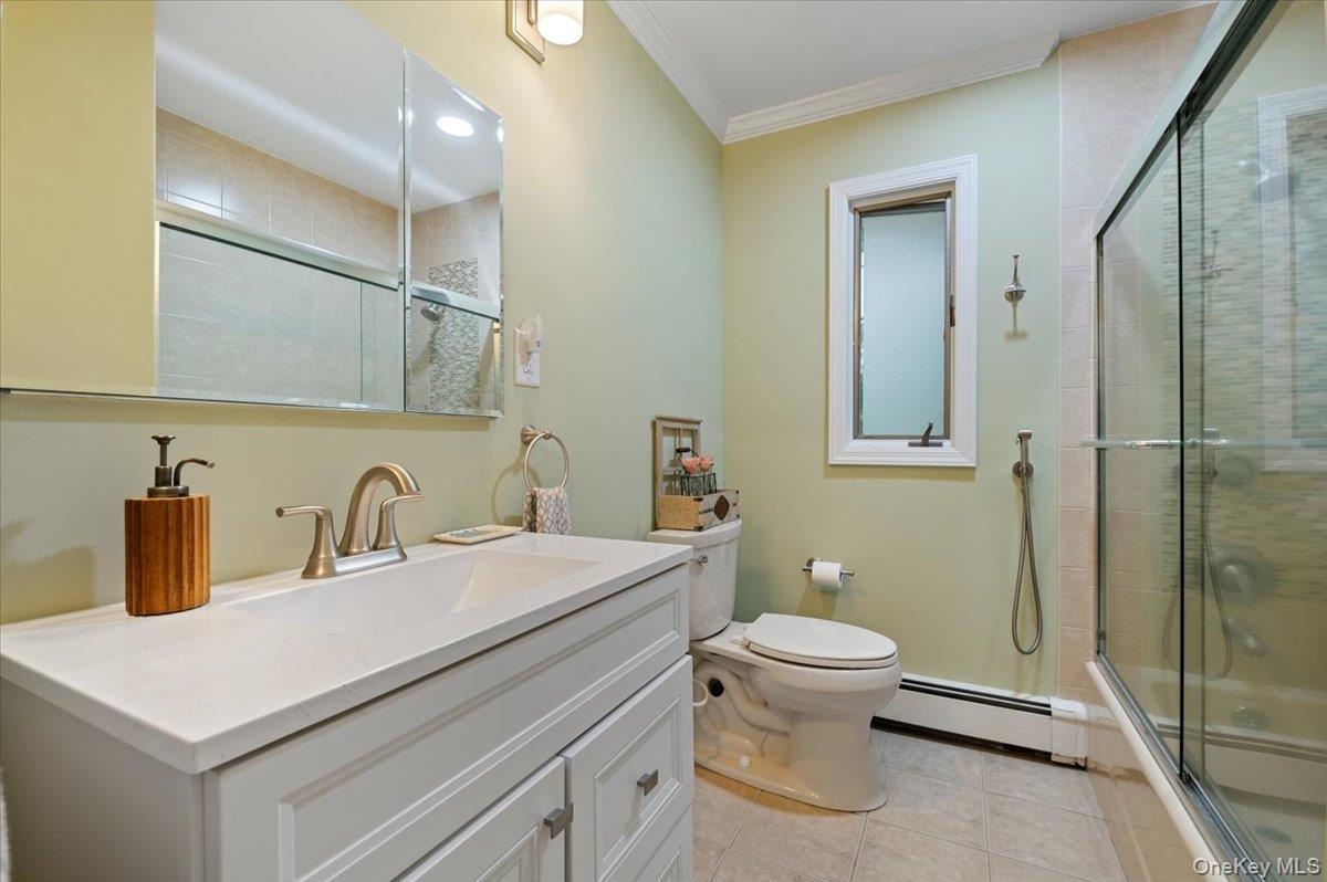 New Main Level Full Bath with Tub and Glass Shower Doors