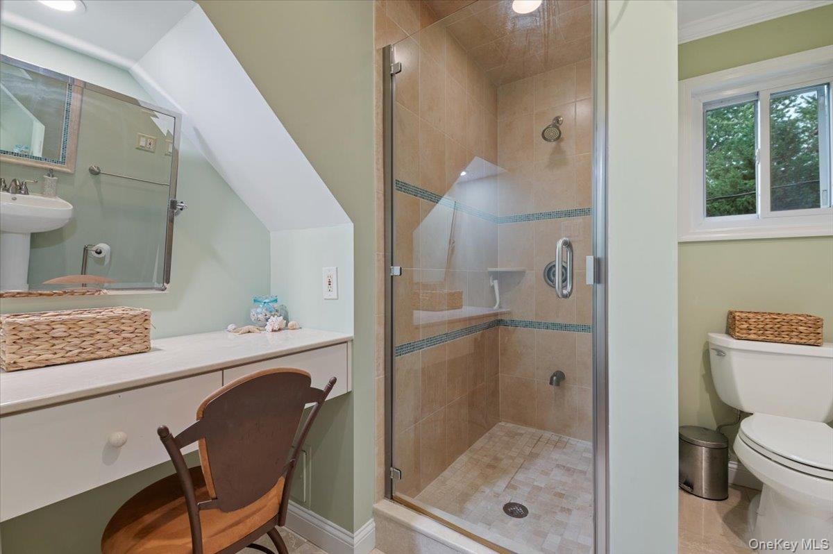 Second Floor New Bath with Frameless Glass Ceramic Shower and Dressing Area.
