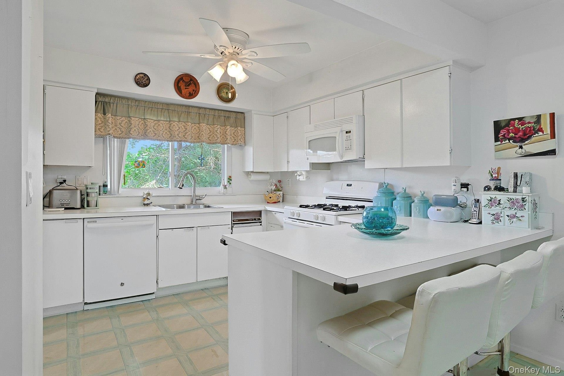 The Kitchen has an abundance of countertop space.