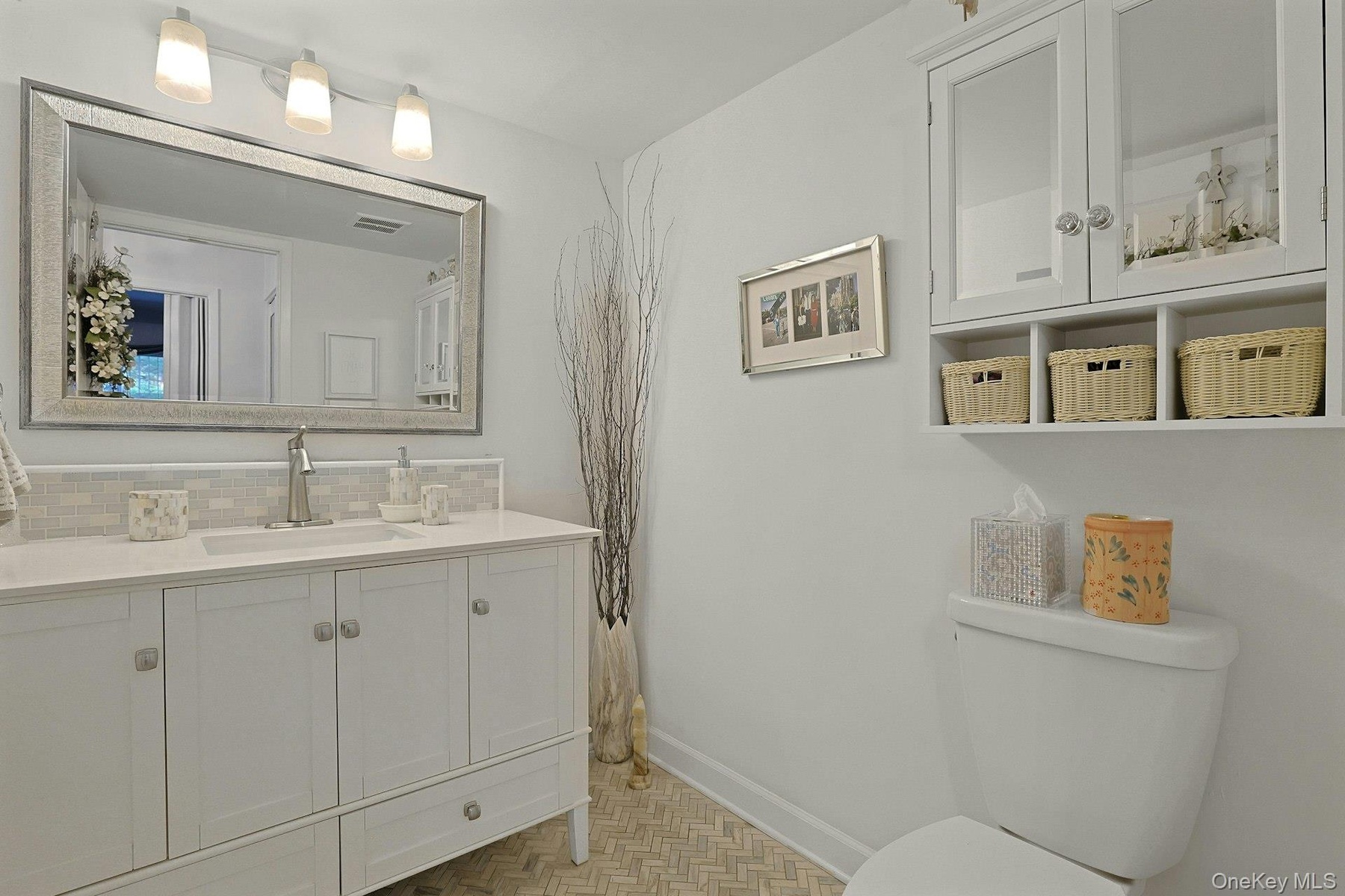 This is the Powder room on the first floor. When entertaining, it makes it easier for your guests to use this Bathroom rather than go upstairs to the 