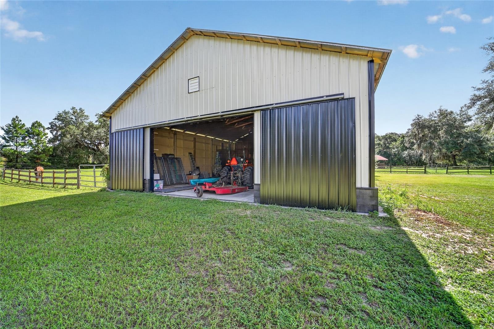 Large Equipment Shed with New Metal Siding
