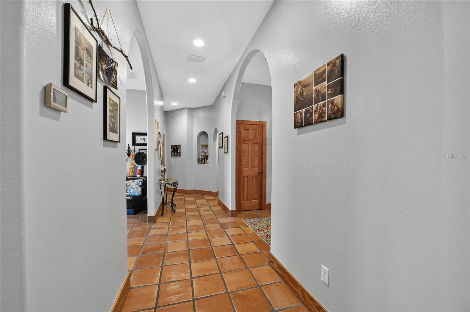 Private Hallway Leading to the Primary & Secondary Ensuite Bedrooms
