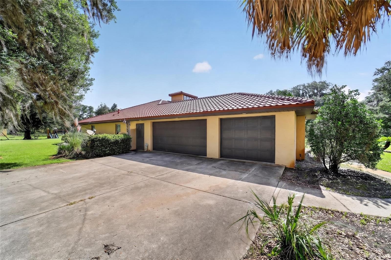 Oversized Side-Load 3-Car Garage with Ample Storage Space