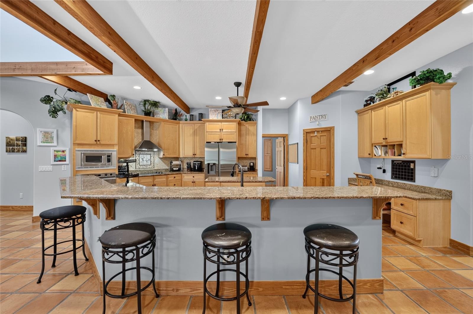 Gourmet Kitchen with Granite Countertops & Breakfast Bar