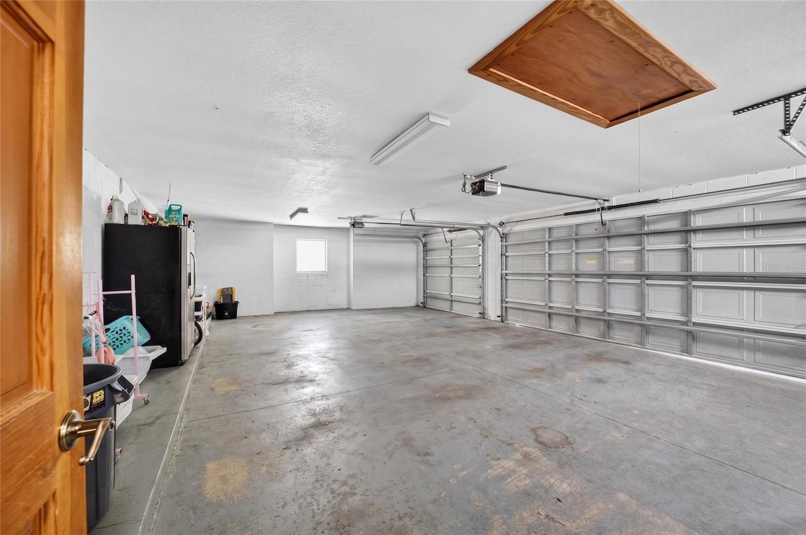 Oversized Deep 3-Car Garage with Ample Storage