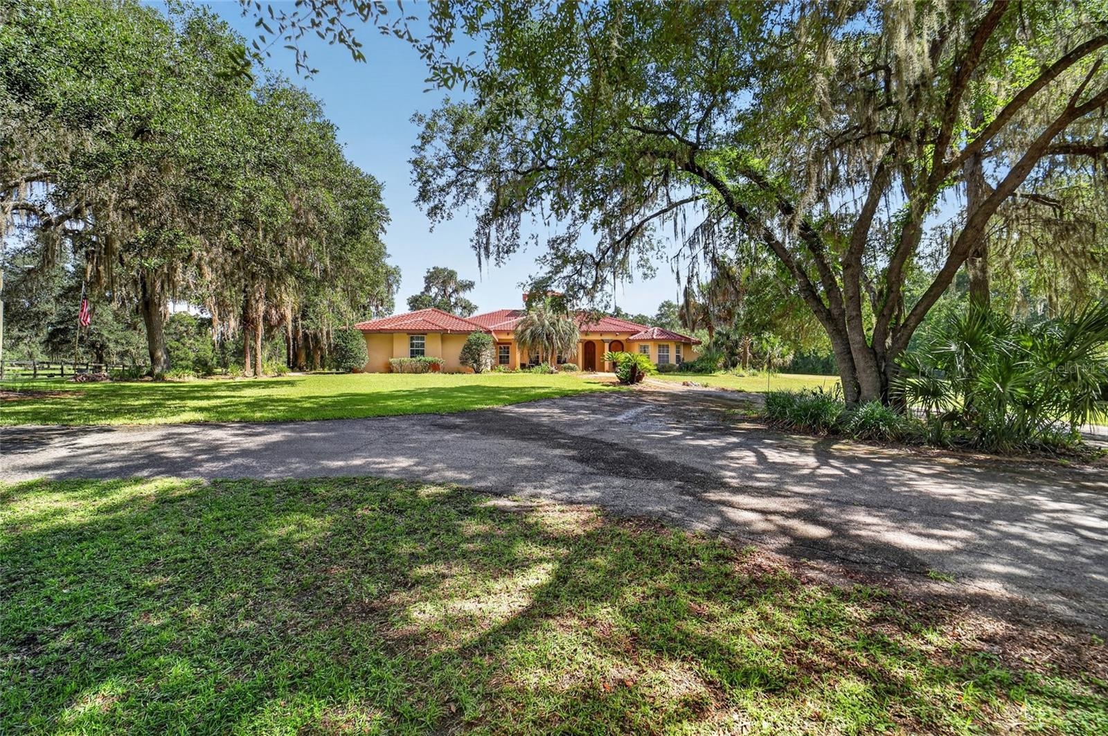 Mature Shade Trees & Circular Paver Driveway