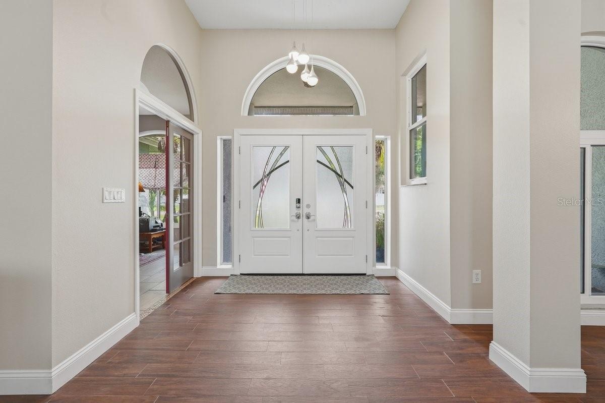 Foyer that opens to the dining room and front living room.